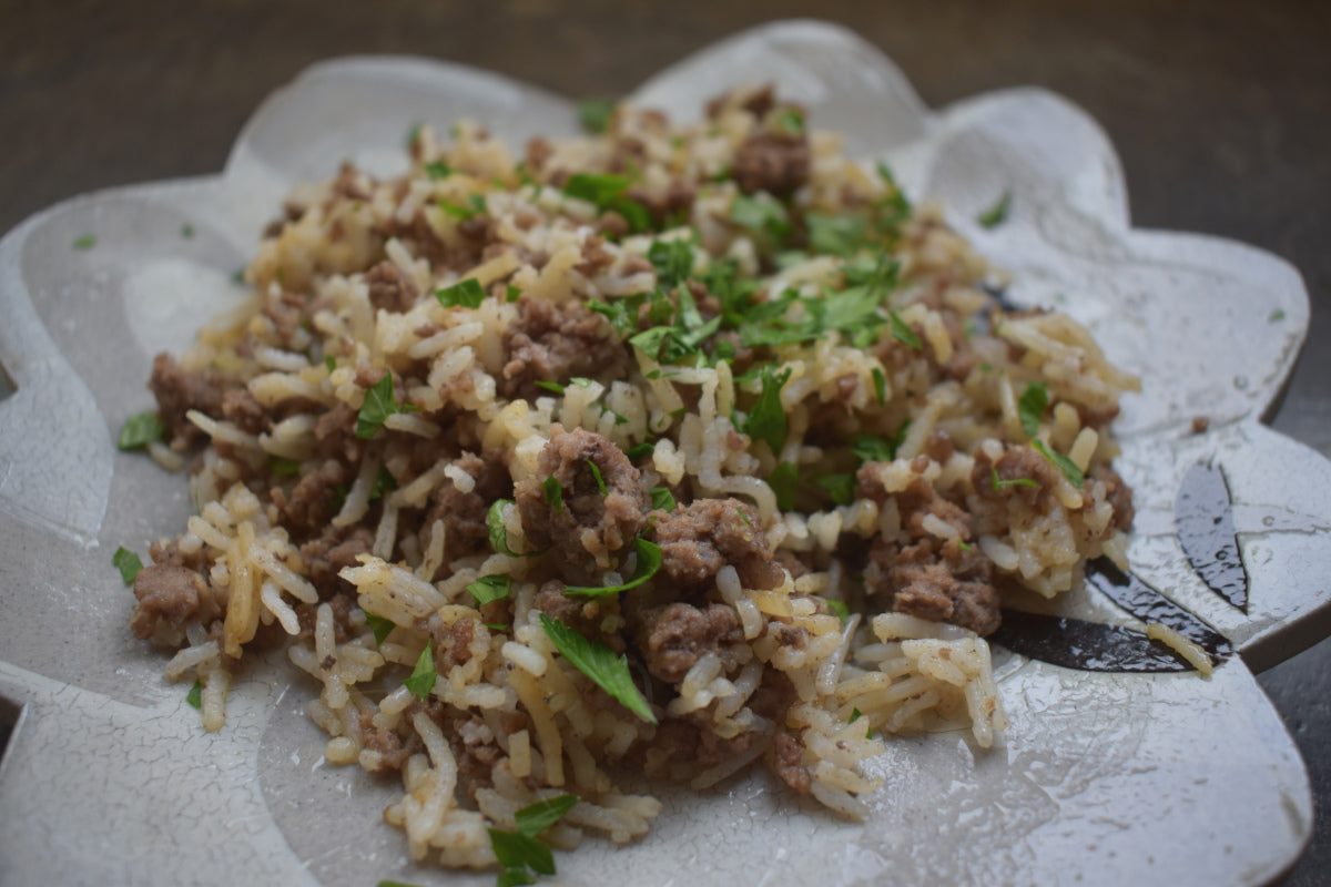 Sauteed hamburger and rice on a plate