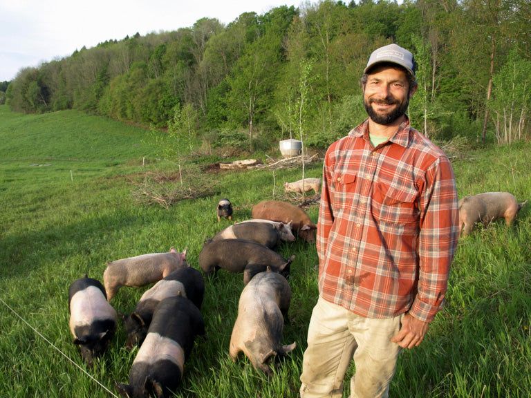 https://cairncrestfarm.com/cdn/shop/files/ed_posing_with_pigs._small_dccdd3e0-db31-4a0e-97f0-17b9dd90bfad_960x.jpg?v=1690982902